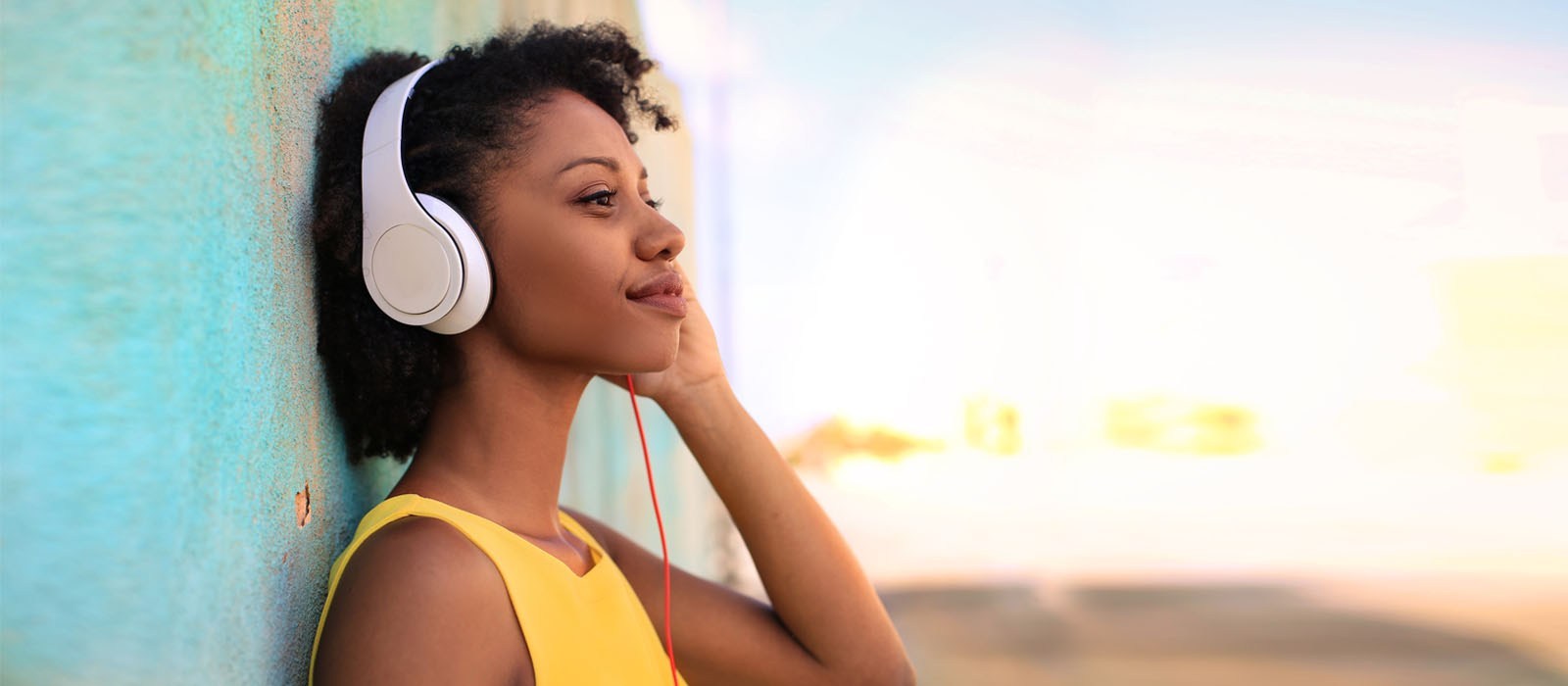 Female-with-Headphones-banner